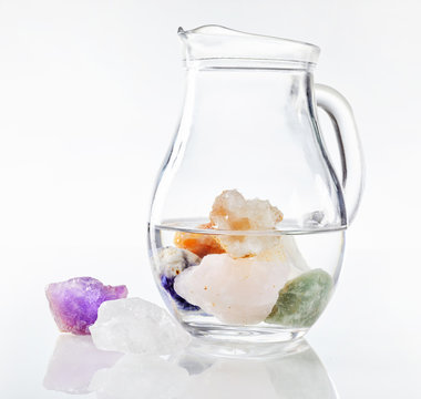 Jug of drinking water with healing stones