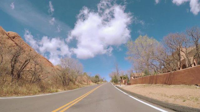 POV point of view - Driving through the park with large red sanstone formations