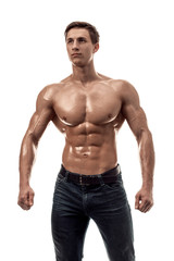 Fototapeta premium Muscular handsome young man with naked torso. Isolated on white background.