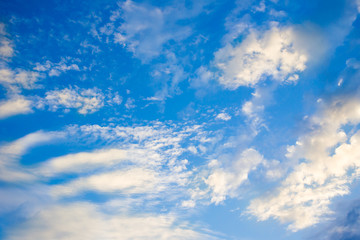 Beautiful a group of clouds in the blue sky during the sun shin background.