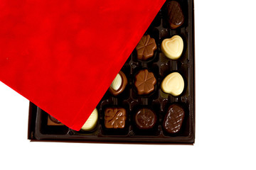 assorted chocolates in a box isolated on white