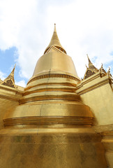 Fototapeta premium Golden Pagoda at Wat Phra Keao Temple in Grand Palace, Bangkok Thailand