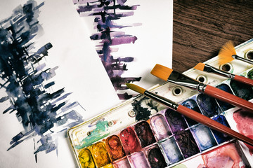 watercolor  brushes and paper