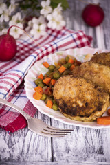 Fried meat patties with vegetables