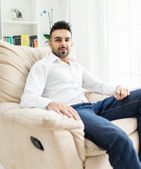 Fototapeta premium Young confident man at home
