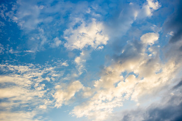 Beautiful a group of clouds in the blue sky during the sun shin background.