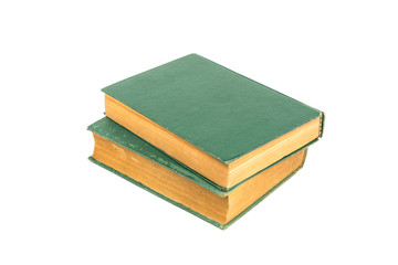 stack of old hard cover books on white background