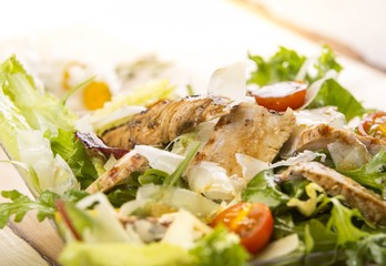 Ceasar salad on a wooden table