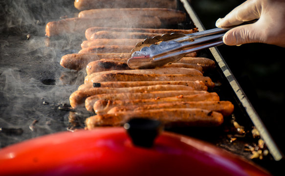 Sausages Grilling On Hot Barbeque