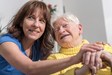 Portrait of happy grandmother with her daughter