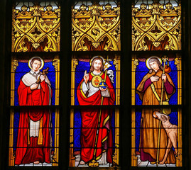 Fototapeta premium Stained Glass - Jesus Christ, Saint Roch and Saint Charles Borromeo