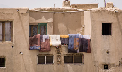 Airing the quilts at Kabul house, Afghanistan