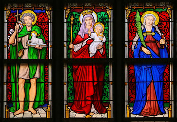 Fototapeta premium Stained Glass - Saint John the Baptist, Mother Mary and Saint Apollonia