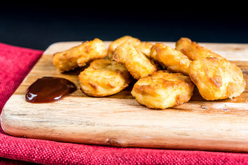 delicious fried Chicken nuggets with sauce