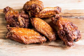 delicious fried chicken wings with sauce
