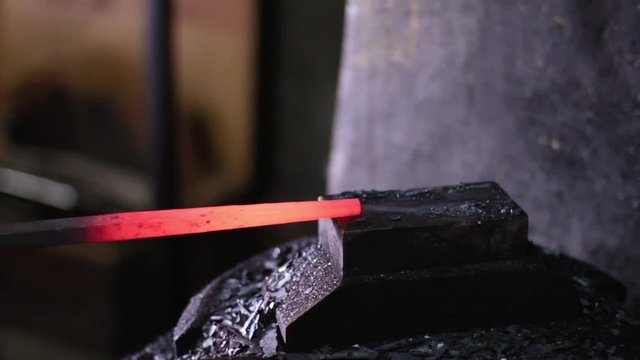 Using Pneumatic Hammer to Shape Hot Metal