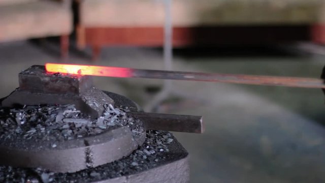 Using Pneumatic Hammer to Shape Hot Metal