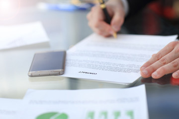 Business man signing a contract
