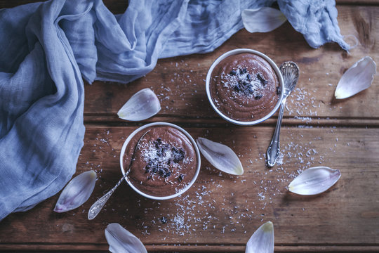 Chocolate coconut millet pudding served in little bowls