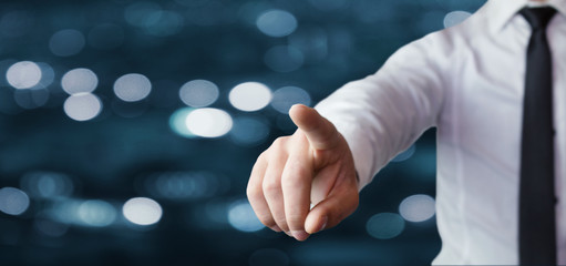 Businessman pointing finger.