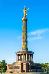 Fototapeta na wymiar Victory Column in Berlin on sunny day with blue bright sky. 