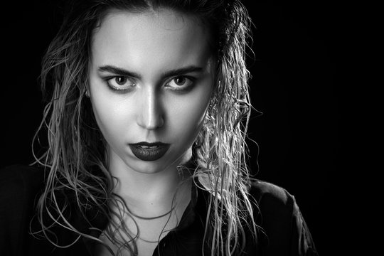 beautiful young woman with wet hair portrait, monochrome