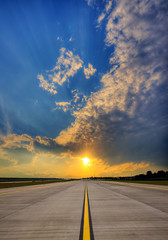 Airport runway on sunset