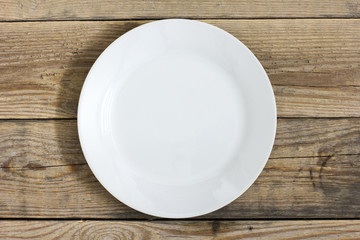 Empty Plate On The Wooden Table ./Empty Plate On The Wooden Table 