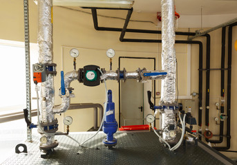 An industrial gas boiler-house with a multitude of tubes and sensors