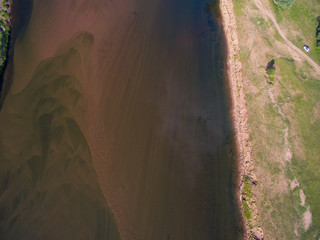 Shallow-water river with a sandy bottom. Aerial view