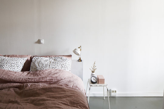 detail of a bed in a modern loft