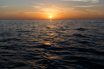Fototapeta premium Image ofsunset by sea