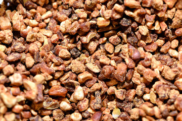Food ingredients close up photography - crushed dried apples.