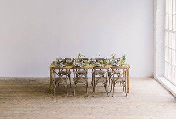 Rustic serving with wood and plant decor