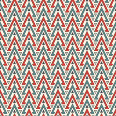 Ethnic style seamless pattern with repeated triangles. Native americans ornamental abstract background. Tribal motif.