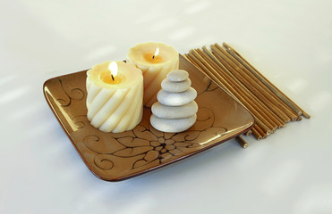 Decorative tray with candles, bamboo sticks and stones zen spa decor