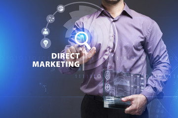 Business, Technology, Internet and network concept. Young businessman working on a virtual screen of the future and sees the inscription: Direct marketing