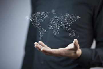 Businessman showing map of world wide