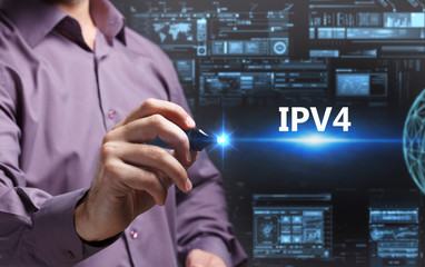 Business, Technology, Internet and network concept. Young businessman working on a virtual screen of the future and sees the inscription: IPv4