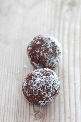 chocolate balls on wood background