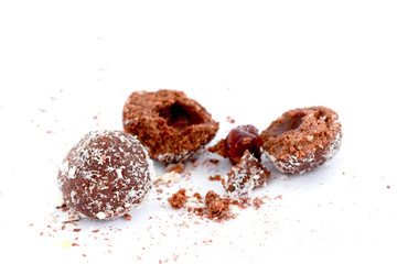 chopped chocolate balls on white background