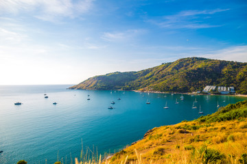 Yatch boat on Andaman sea with yellow grass