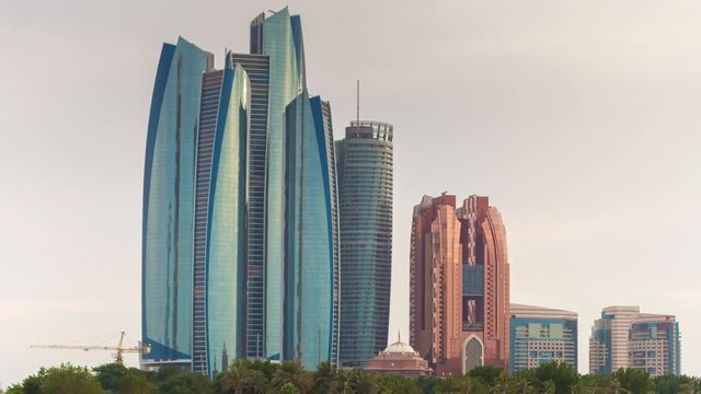 sunset light abu dhabi famous business block downtown panorama 4k time lapse uae
