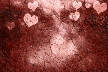Concept broken hearts symbol on cracked background.