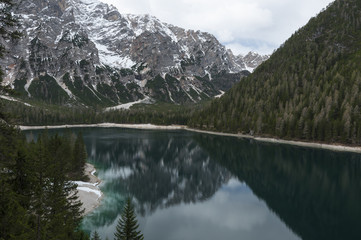 Fototapeta na wymiar Springer landscape of Braies lake, Trentino, Italy