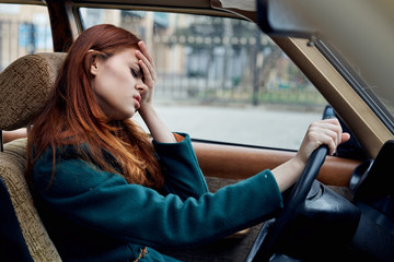 Fototapeta na wymiar beautiful woman driving a car, stress, accident, emotions