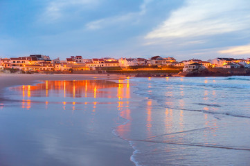 Fototapeta na wymiar Coastal town at twilight. Portugal