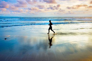 Jogging at the ocean beach