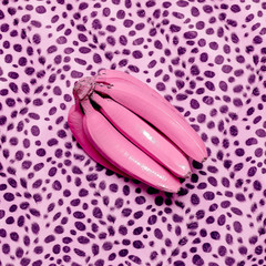 Pink banana and animal print.Surreal minimal art