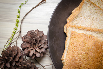 Whole wheat bread image on wood table in kitchen